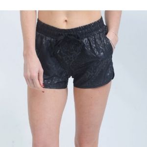 Black leopard bomber shorts